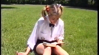 A college girl with blond duvets gets fucked on the lawn.