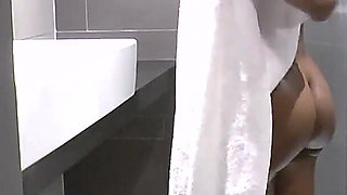Muscular Woman Piss in the Shower