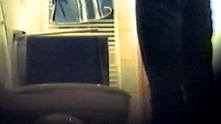 Girl using the toilet and filmed by voyeur 2