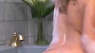 The Blonde Pussy Has Fun in the Bathtub