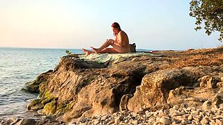 Redhead Mira Love Gets Sunscreen and a Hard Fuck on Nudist Beach