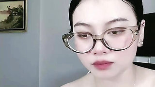 Woman with wet breasts glasses