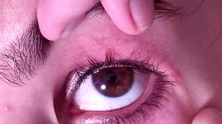 Cum container gets full cumshot in her open eye while talking
