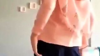 Turkish Arab in Hijab and Turban Performs a Striptease