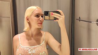 Naughty public masturbation in the fitting room, will she get caught playing with herself?