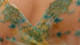 Asian Woman Plays with Oil in Bathroom