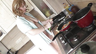 Wife. MILF. Sexy blonde Milf naked in high heels cooks another dish in kitchen and shows tits, pussy, ass. Naked in public Wife