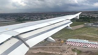 Perverted guy shows his cock midflight, she jerks him off