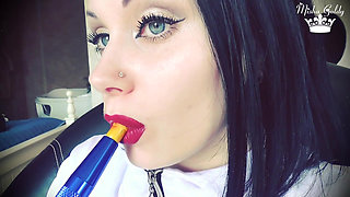 Smoke from dark red big lips