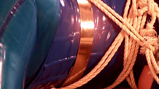 Latex bondage escape, sexy MILF submissive in rubber with gag