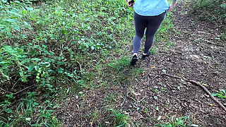 Completely naked in the field banging her breasts