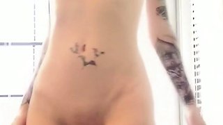 Busty curly brunette with big boobs fucks on couch