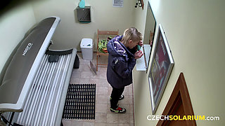 Czech Solarium 54: Blonde Young Woman Strips Down and Flashes Her Pussy