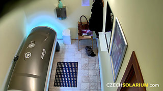 Czech Solarium 15: Busty Young Woman Exposes Everything Without a Care