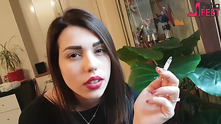 Smoking in close up with a beautiful girl