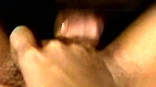 A super sexy brunette massages her big boobs