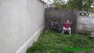 Pissing in the backyard on a cold day, and leaving on her bike