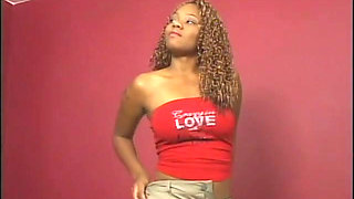 Chocolate chick black dicked on a white leather couch