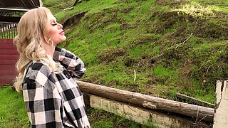 Blonde is flashing her big boobs in the outdoors