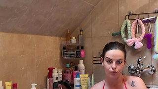 Stunning milf brunette Katy Feet first washes wet soles and then her perfect toes with soap