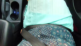 Mature aunt teases her stepson with her sexy legs in the car.