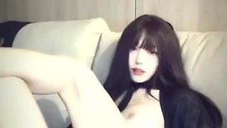 Japanese Stunner Taunts in Black Undergarments