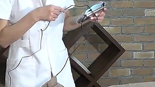 CFNM, Mischievous Esthetician Attaches Electric Current Sheet to Customer's Dick and Watches It Twitch with a Grin