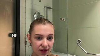 Jucielussie playing in the bathroom