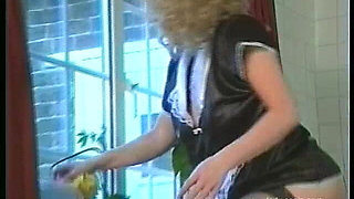 Young Maid in Rubber