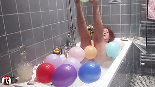Taking a Bath and Playing with Balloons