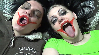 Two crazy clown girls dangle you above their hungry mouths before fighting over who will eat you alive
