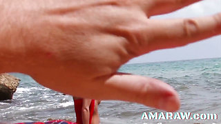 Brunette Shannaya Tweeks shared on the beach between two men