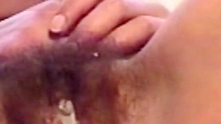 Beautiful Stepmother Smoking Through Her Big Hairy Pussy, She Smiles and Inserts Her Fingers