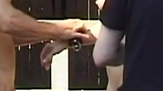 Bound Brunette MILF Shared by Two Masked Studs