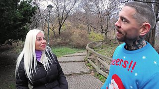 Two guys share Suzi Grande’s big tits and shaved pussy in steamy threesome