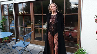 A Mature Woman Shows off Her Figure Outside in a Lace Bodysuit!
