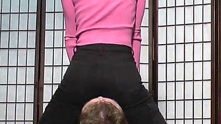 Under Dyanna's Black Trousers