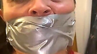 Latina Tied up and Gagged with a Tape Wrap (smaller Size)
