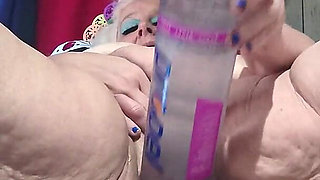 Big Bottle Plugged Clit Cunt