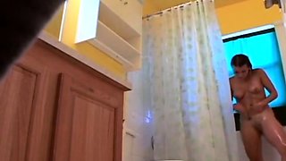Stepdaughter 21 shaves pussy in shower (voyeur)