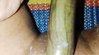 Bangladeshi girl fuking her tight pussy with begun brinjal.