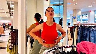 Busty Brunette Flashes in Store