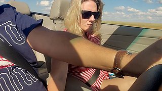 Truck driver enjoys the stunning view of a hot ash-blonde babe squirting in a convertible BMW