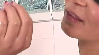 Beautiful brunette with great breasts and ass oils herself up and masturbates