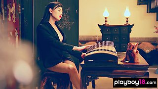 Chinese porcelain doll shows her pussy