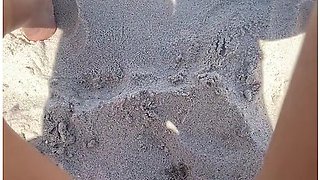 Squirting At The Nude Beach While People Walk By