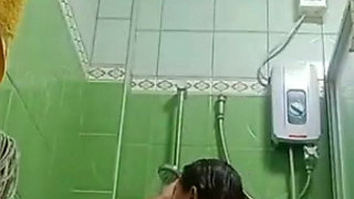 Assy taking a bath .i cum to her for seeing nude