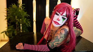 Fantastic stranded redhead teen flashing her big boobs