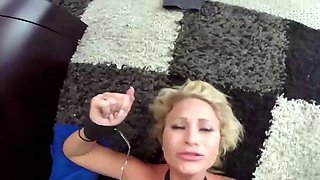 A platinum-blonde doll with ample boobies gives a POV suck