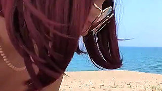 Stranger on the Beach Picks up Lifeguard